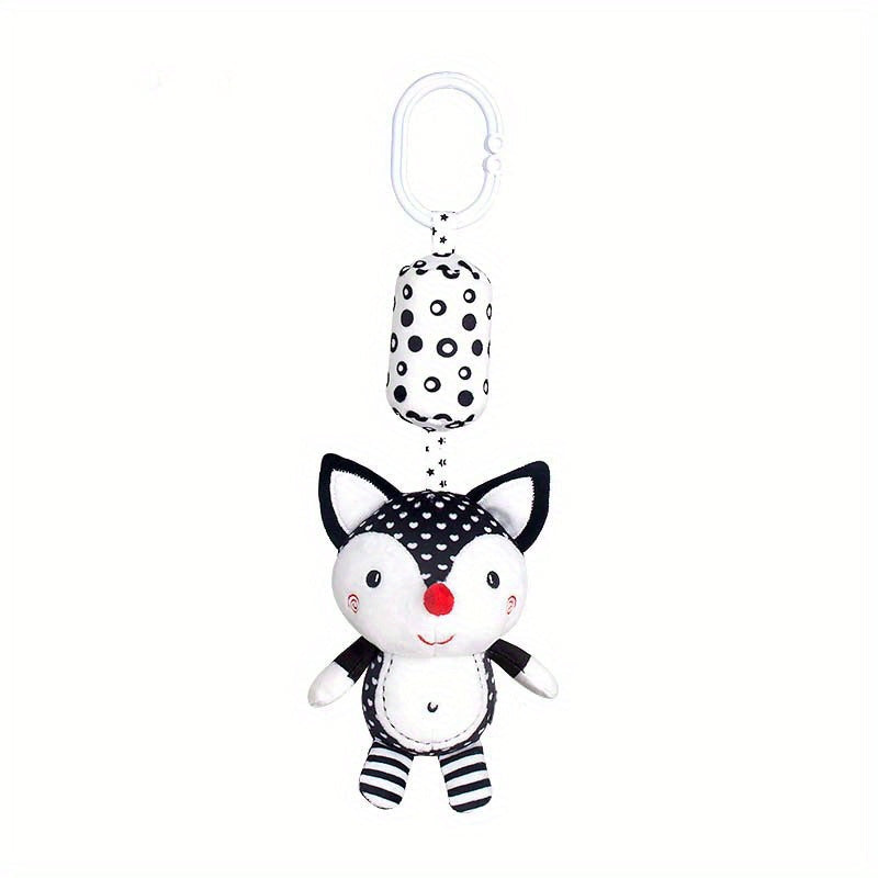 Black and white rattle wind chime for visual training in babies, perfect for early education and development. Makes a great gift for babies and toddlers.