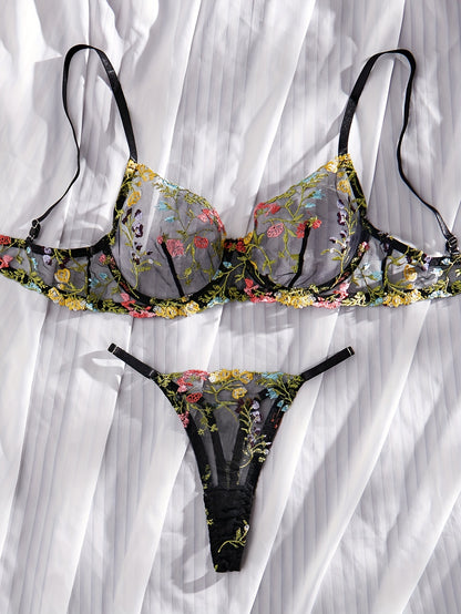 Floral embroidery underwear set with semi-transparent gathered bra and thong panties for a sexy and fresh look.