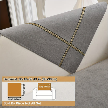 Elegant gray chenille sofa cover with golden braided trim. Non-slip, pet-friendly, and fits single to four-seater sofas. Perfect for all-season use as an elegant home decor in the living room.