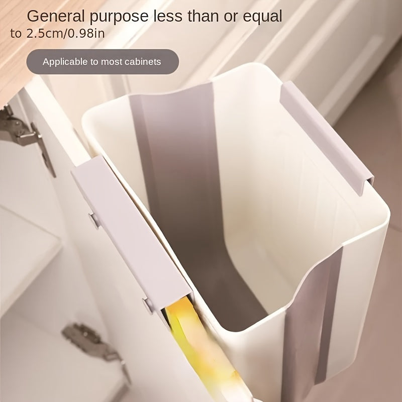 Thickened, foldable kitchen trash can hangs inside cabinet for storage without bending.