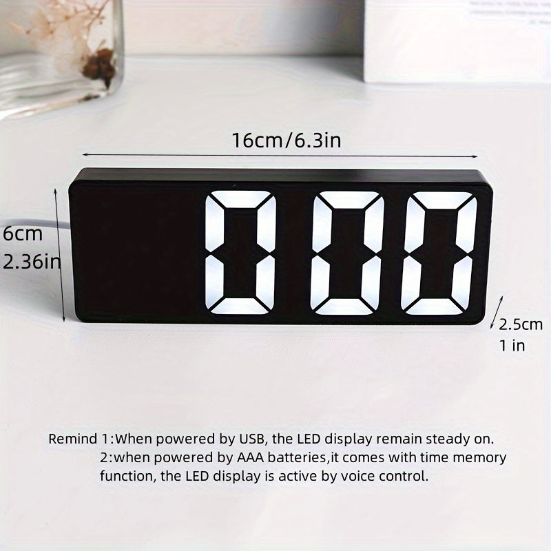 Digital clock with large LED display, mirror surface, dual brightness levels, and battery or USB charging, ideal for home décor.