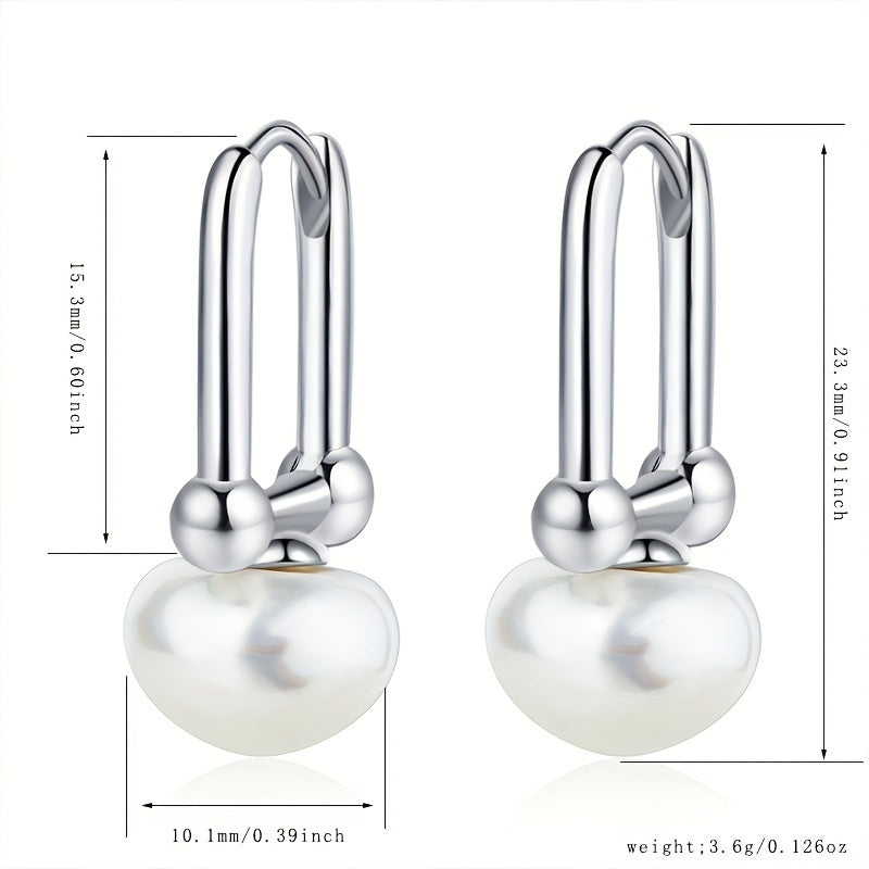 High quality and hypoallergenic jewelry made with 925 sterling silver dangle earrings featuring inlaid freshwater pearls. Perfect for daily outfits or party accessories.