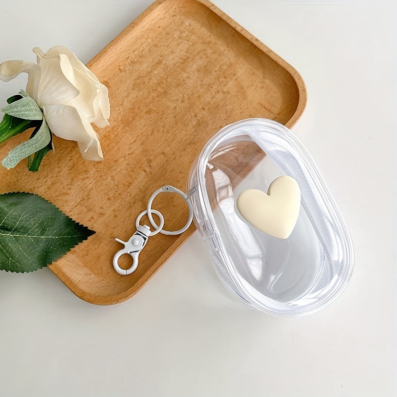 Waterproof heart-shaped PVC bag with keychain for organizing cables and headphones.