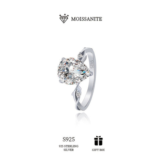 2 carat Moissanite pear-shaped ring in 925 sterling silver - Ideal for engagement, proposal, or Mother's Day present | Stylish and opulent jewelry with a bohemian flair.