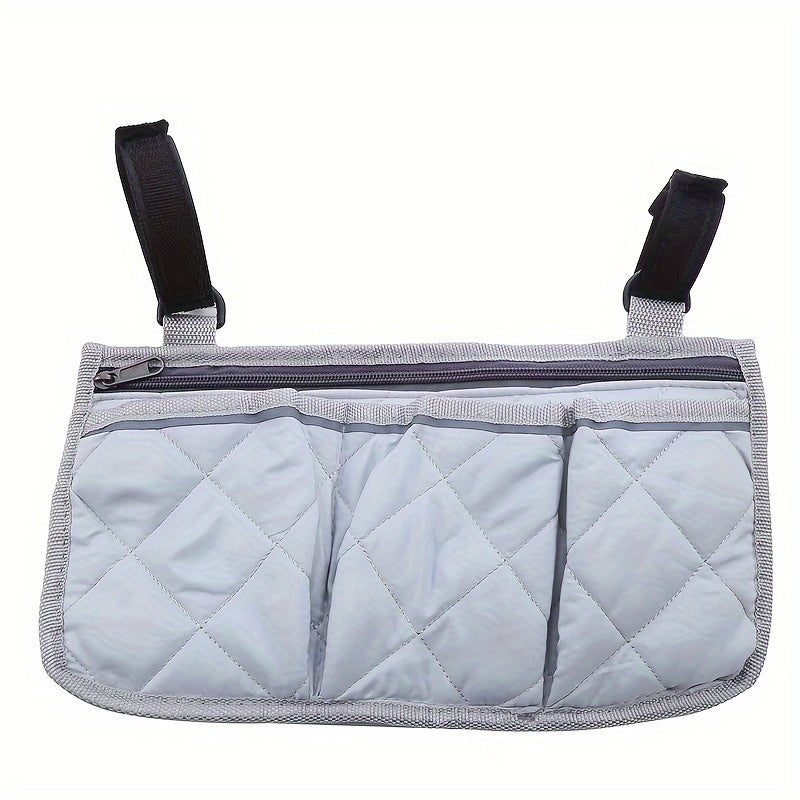 Portable hanging bag for stroller with reflective strip and multiple pockets, featuring armrest attachment and foldable design.