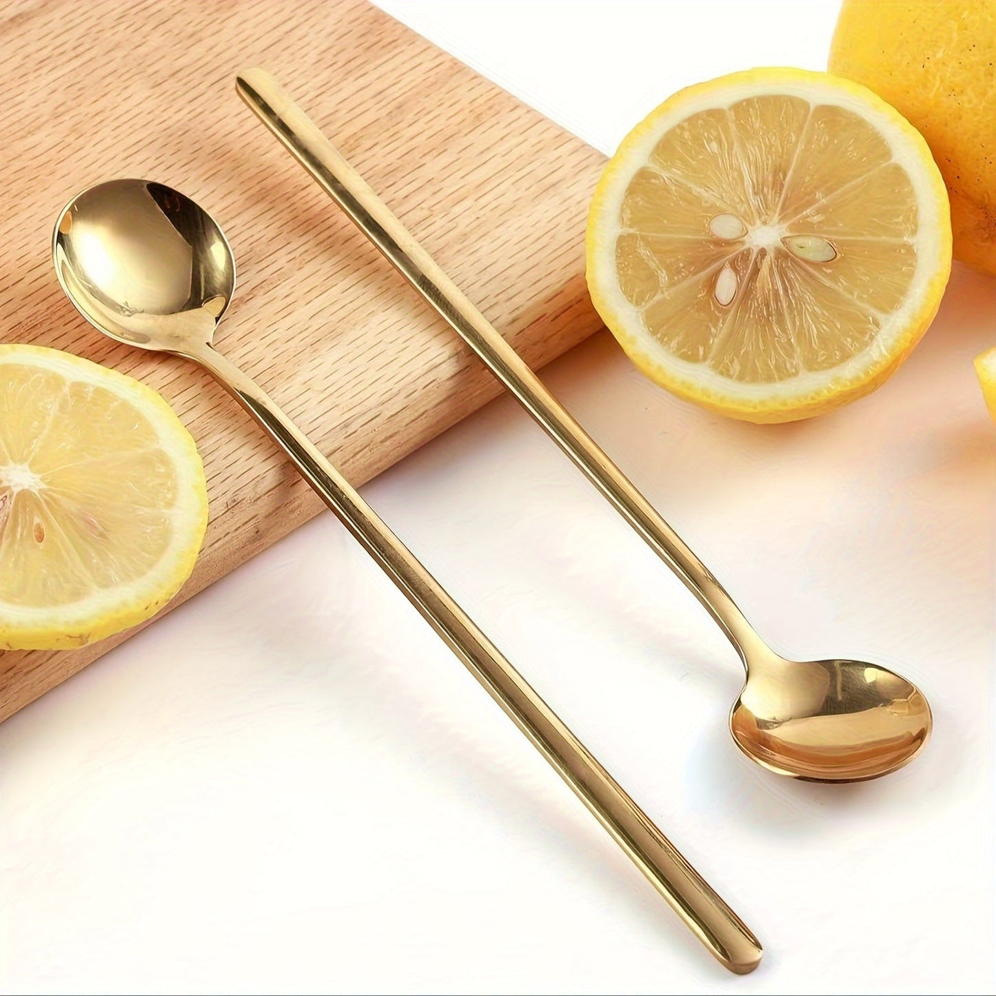 Creative titanium gold long-handled coffee spoon made of 1pc 304 stainless steel, suitable for stirring coffee, honey, and dessert in small mugs.