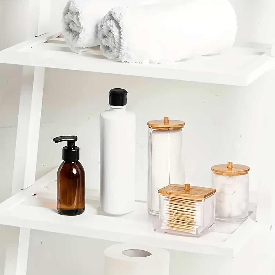 3 transparent storage jars with bamboo lids for organizing swabs, pads, and floss. Includes wooden dispenser box. Ideal for bathroom and home office organization.