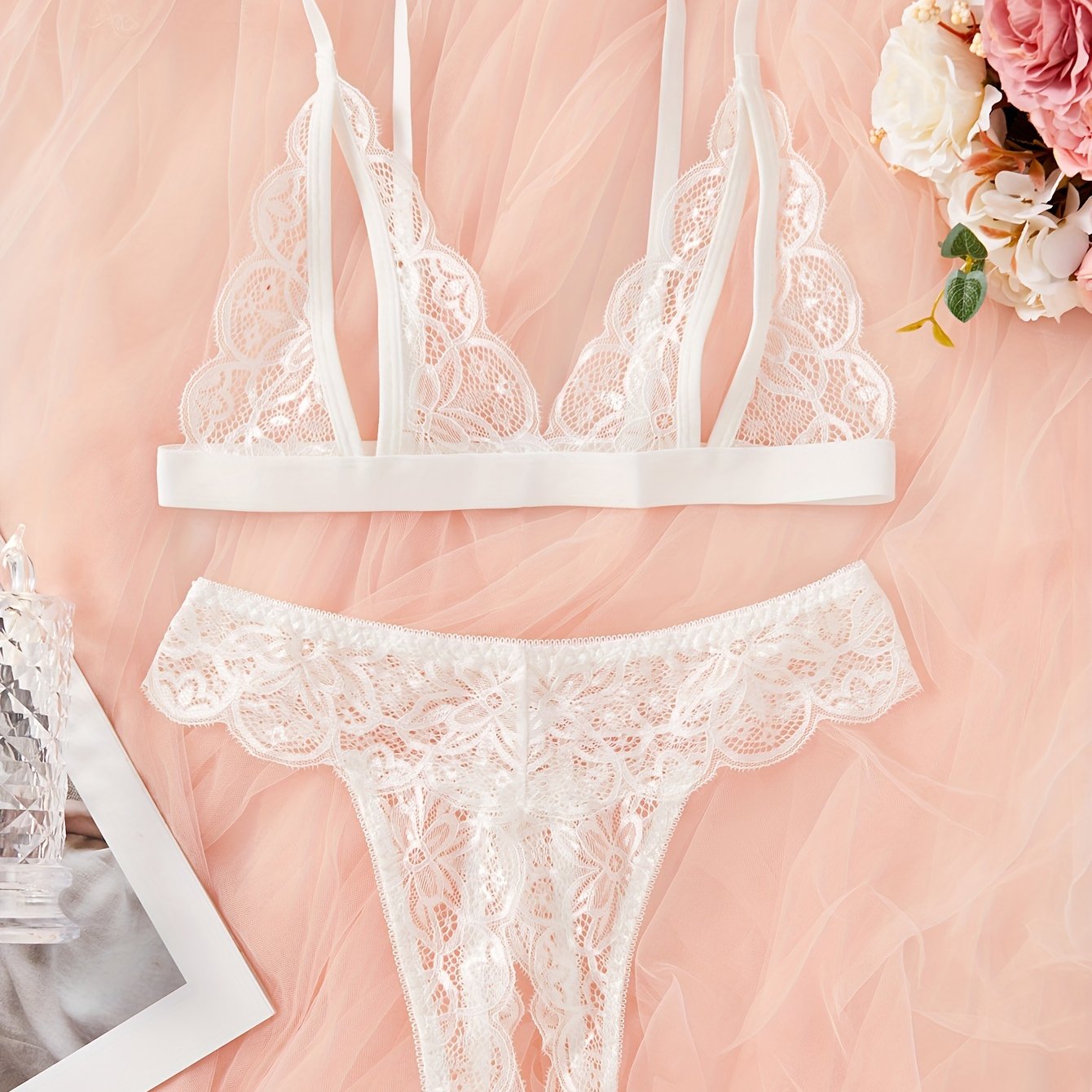 Sexy floral lace lingerie set with open cup bra and crotchless thong.