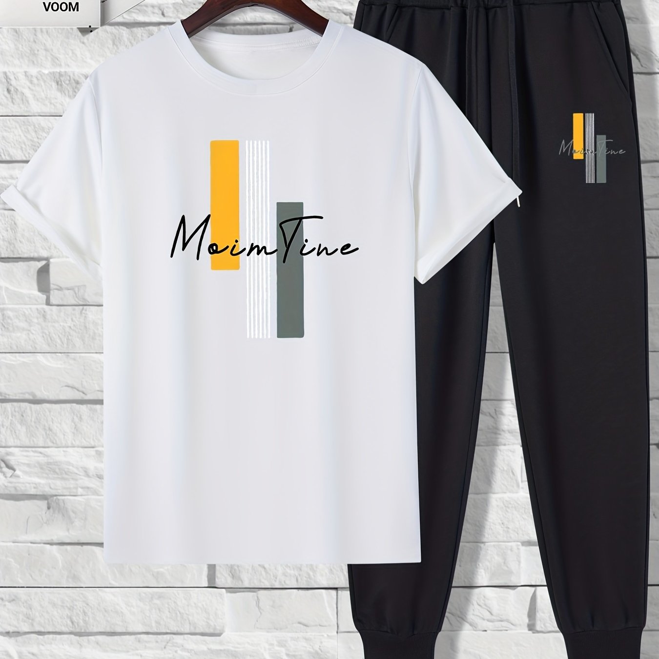 Men's 2-piece outfit with color block print, includes short sleeve t-shirt and drawstring trousers.