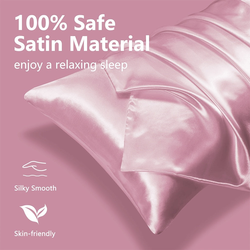 Two-pack of luxurious silky satin pillowcases, made from ultra soft smooth polyester with an envelope closure design. Available in solid colors, these machine washable pillow covers are lightweight at 80-85gsm, providing cooling comfort for hair and