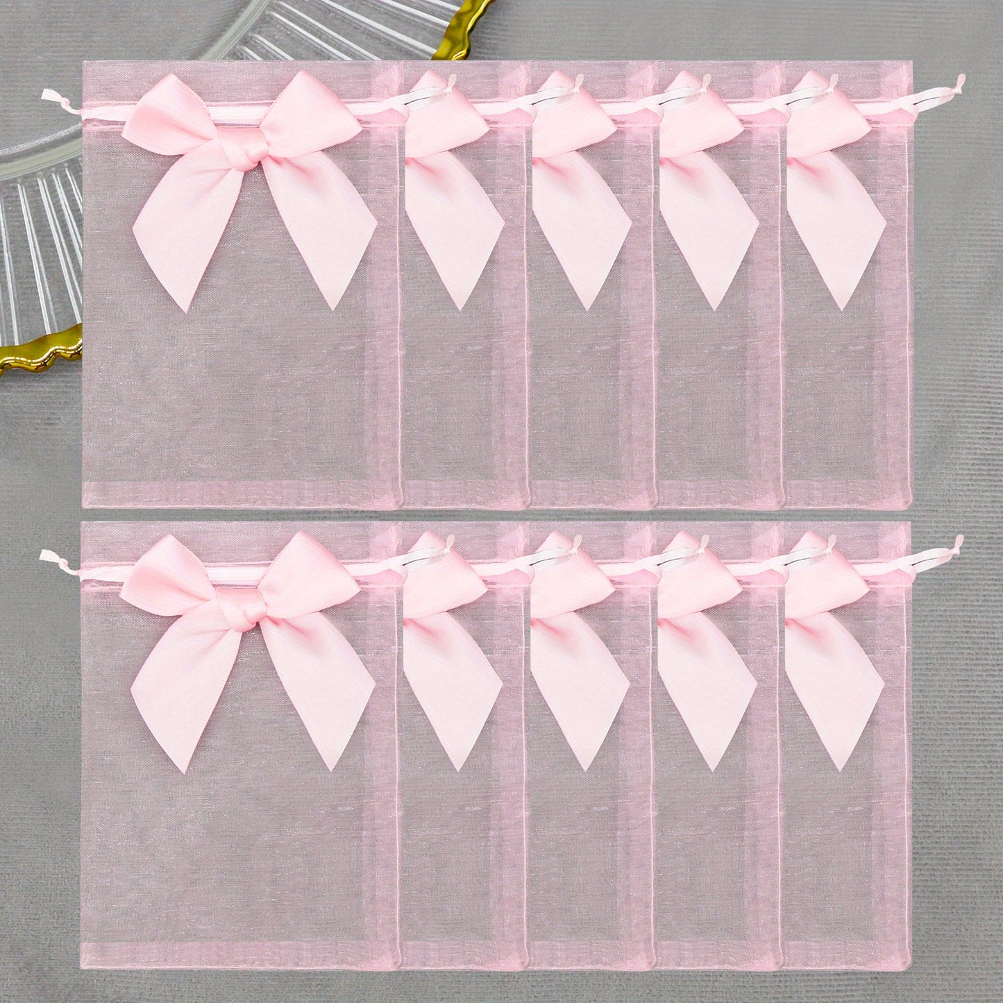 10 elegant organza bags with ribbon and bow, ideal for gift wrapping and party favors.