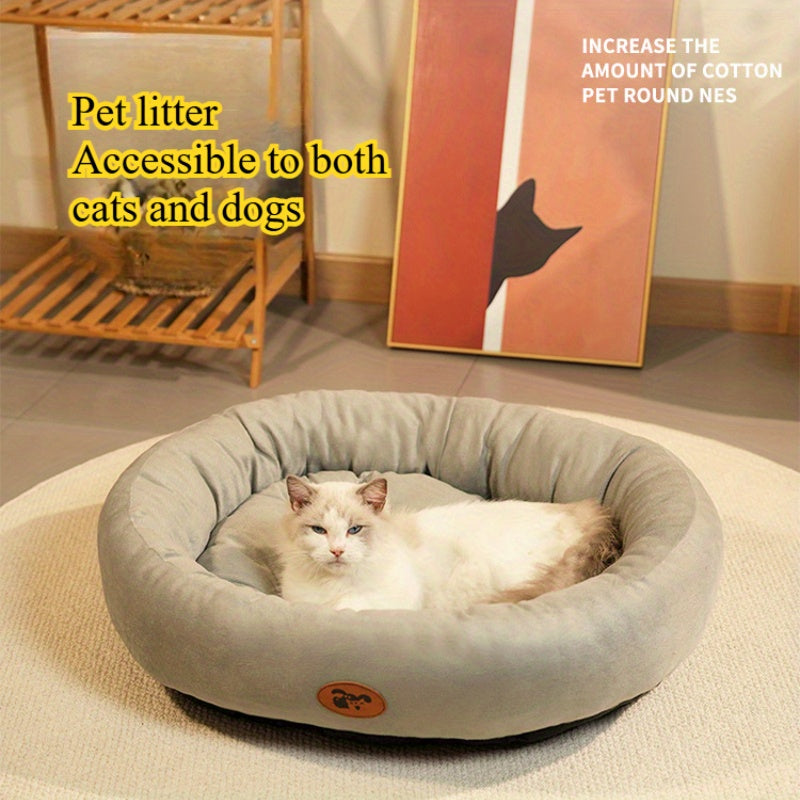 Comfortable oval pet bed for cats and dogs, suitable for all seasons with classic design.