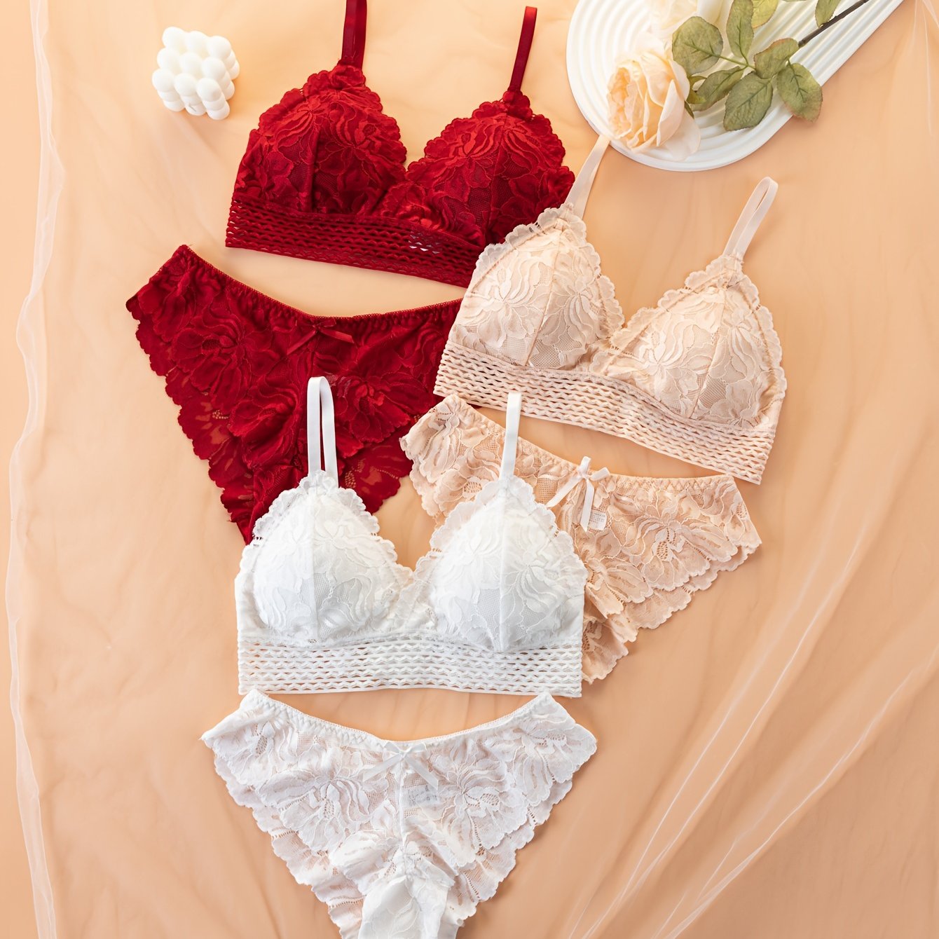 Elegant lace bra and panty set, comfortable wireless design with spaghetti straps and bow decorations. Women's lingerie and underwear set of 3 pieces.