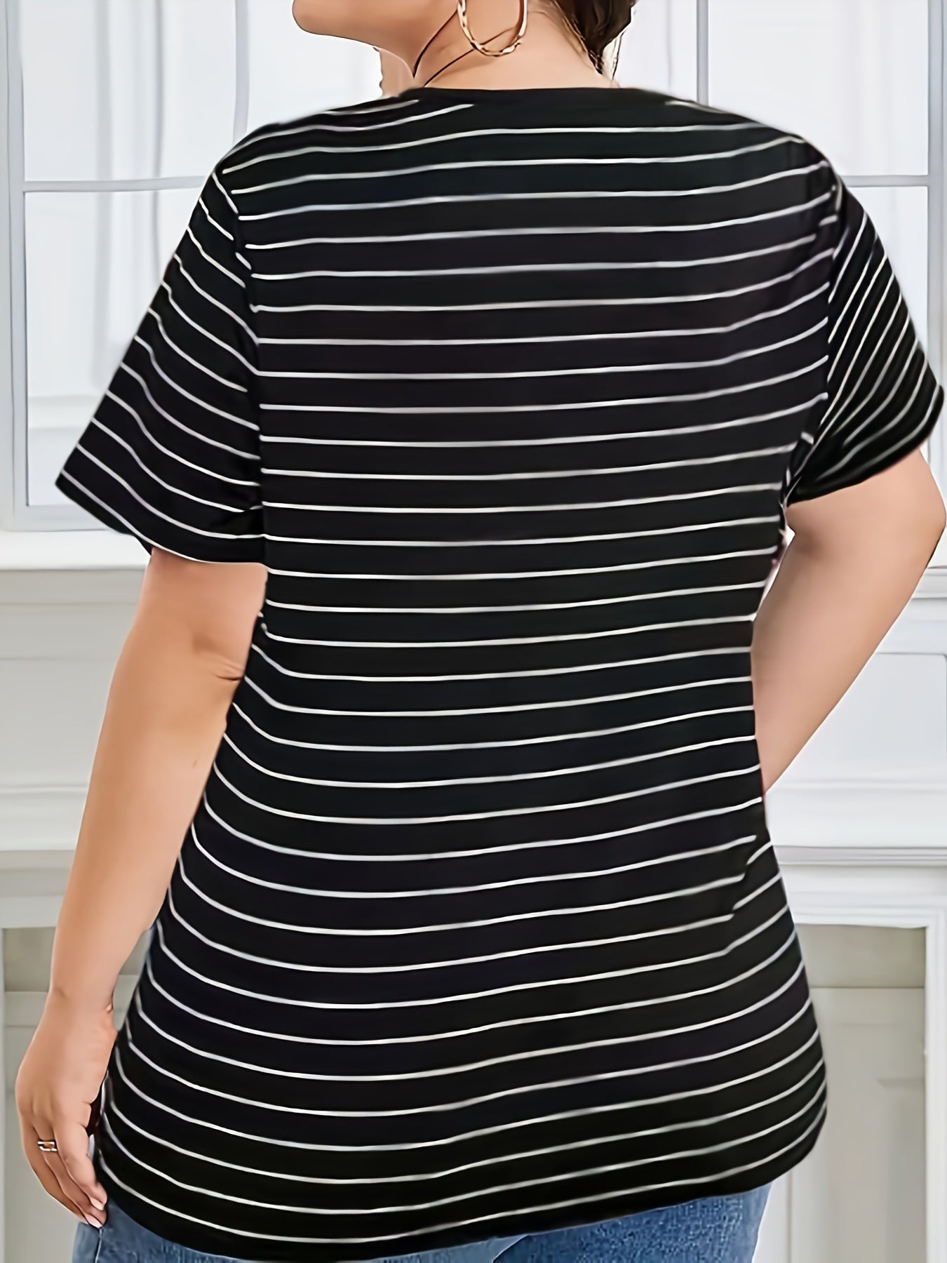 Versatile striped V-neck t-shirt for plus size women, perfect for summer and spring.