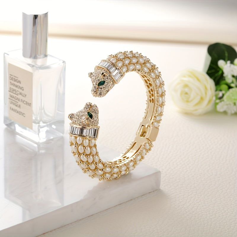 GrayBirds Vintage Elegant Animal-Themed Open Cuff Bracelet featuring a Dual-Headed Tiger Design adorned with Resin and Rhinestones. Crafted from 18K Golden Plated Zinc Alloy, it showcases the July Birthstone and makes a perfect gift for women on their