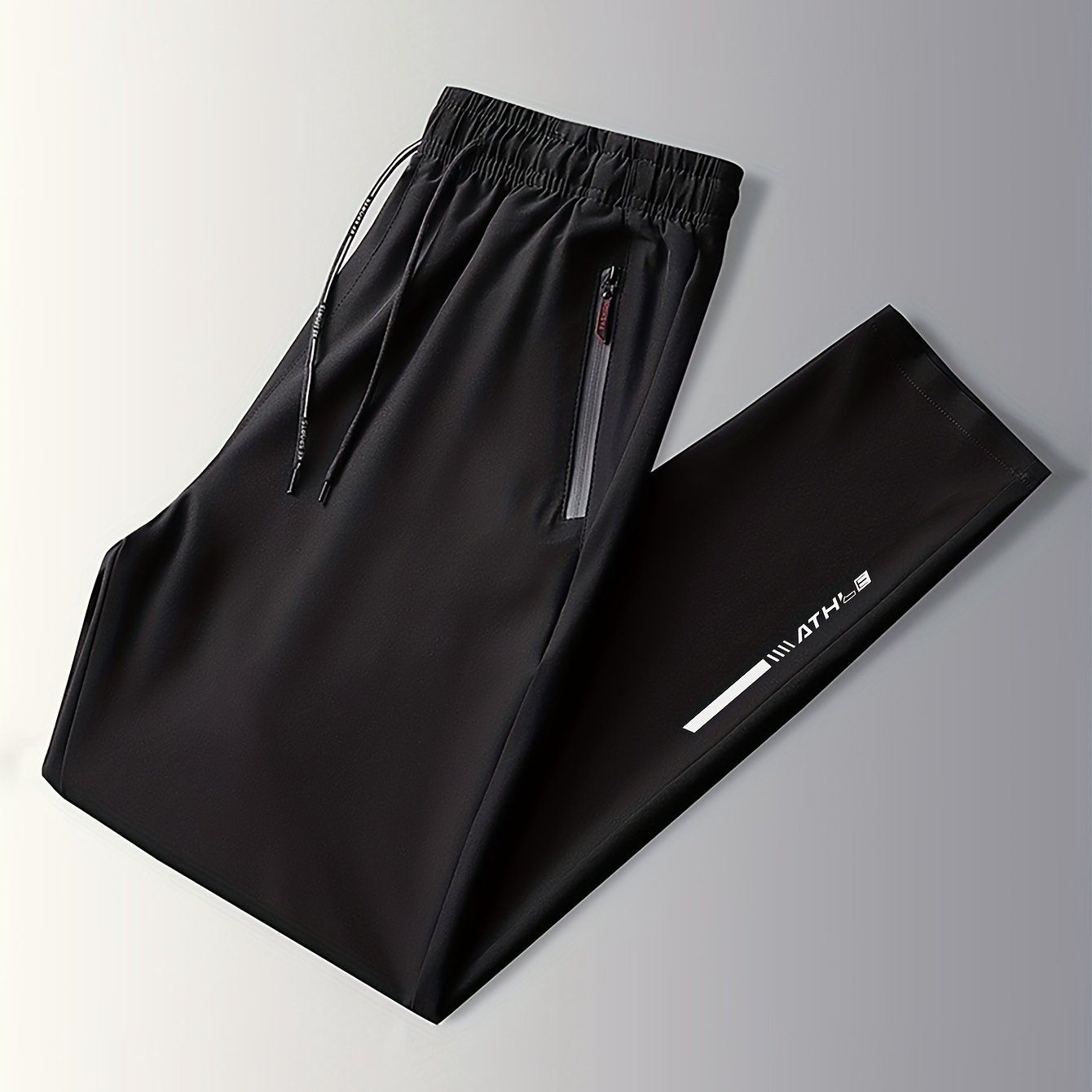 Men's track pants with zipper pockets for outdoor activities gifted.