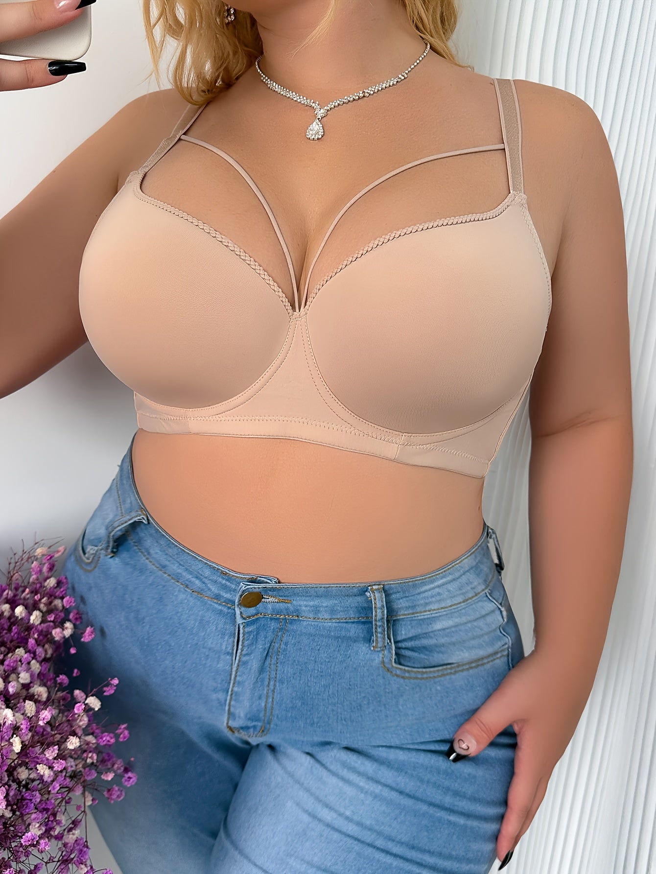 Elegant beige bra for plus size women with push-up design, underwire support, and breathable nylon blend. Hand washable and non-removable pads for comfort and sleek full coverage lingerie.