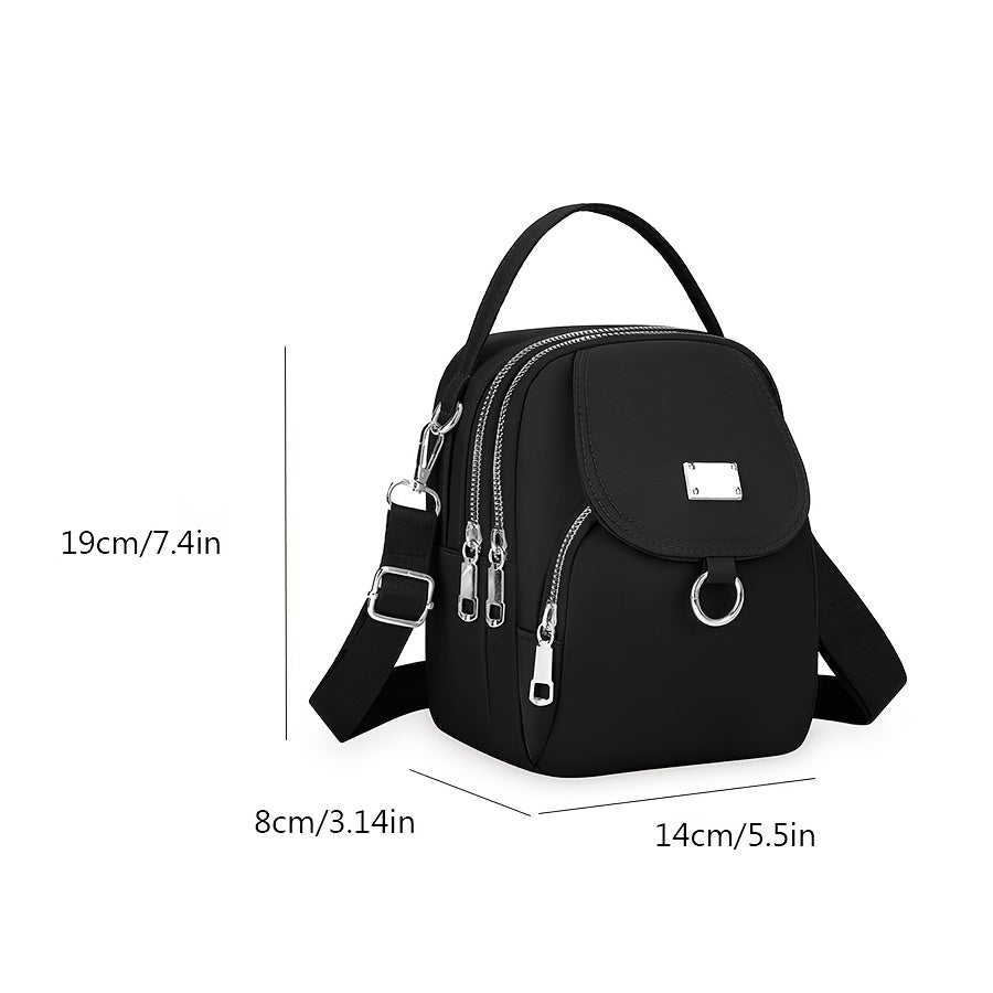 Black messenger bag for women, made of oxford cloth with zipper closure and polyester lining, perfect for daily use.