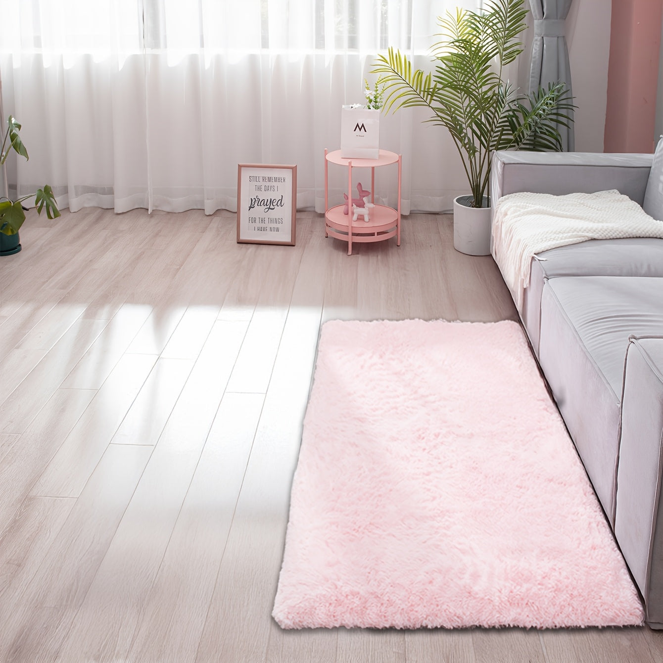 Soft and fluffy rectangle area rug perfect for your bedroom. This plush carpet is thick and non-slip, making it ideal for your living room. Made with machine-made polyester fiber, this low-pile rug is washable for easy cleaning. Perfect for indoor use.