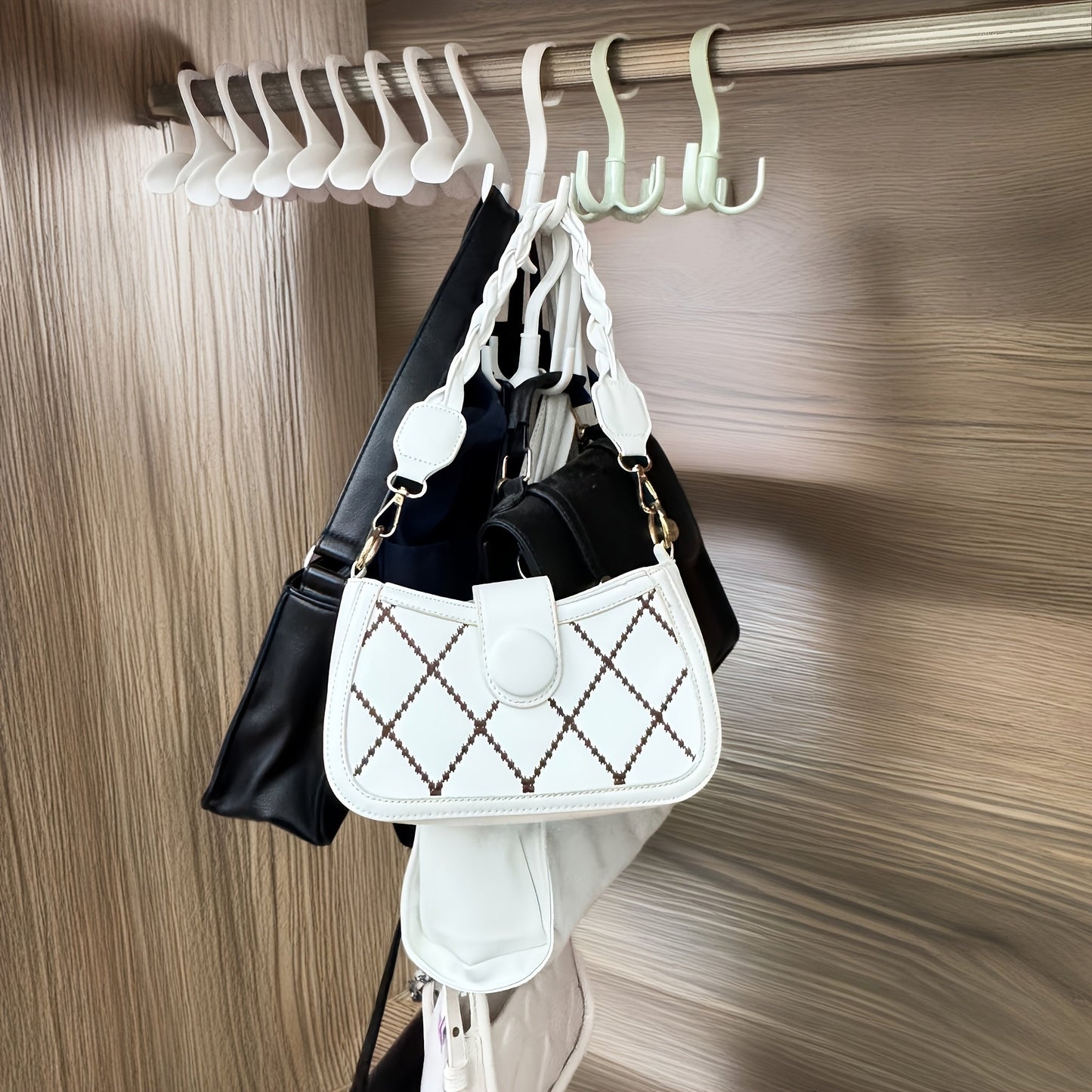 This multifunctional wardrobe set includes 14 pieces of widened design hooks, perfect for storing bags and clothes. The rotating hooks can be used for various purposes, making it a versatile addition to your storage solutions.