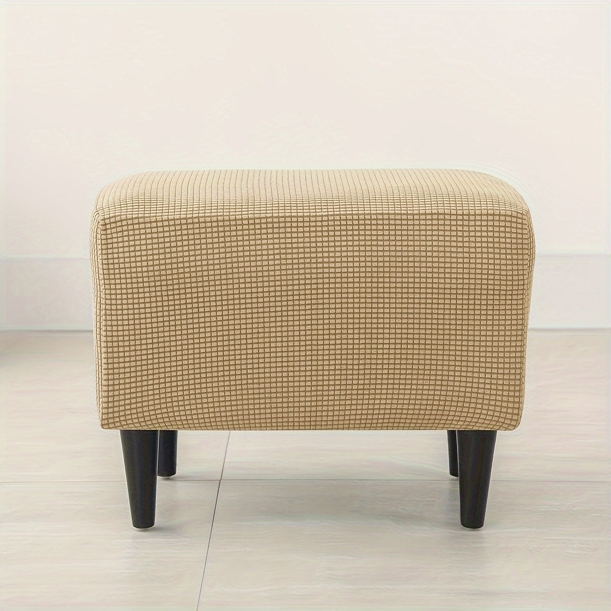 Stretch modern style ottoman cover protects footstools from dust and enhances living room decor.