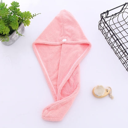 Super absorbent hair towel made of soft and water-absorbing microfiber with anti-frizz and anti-static features, perfect for bathroom use. Made of 100% polyester.