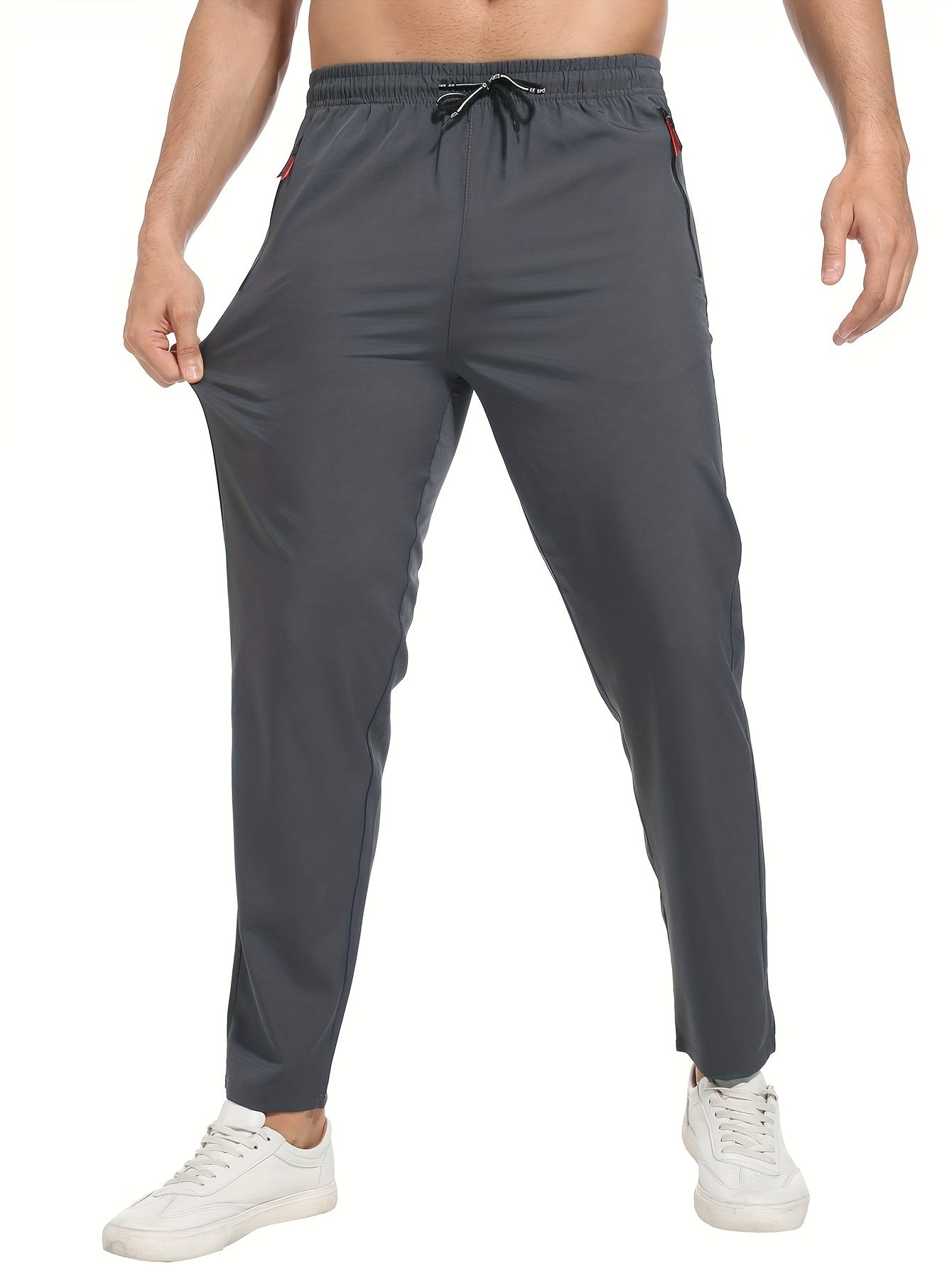 Breathable quick-dry joggers for men with drawstring, zipper pockets, stretchy, lightweight design for running, training, and outdoor activities by EIKELAND Oakspirit.