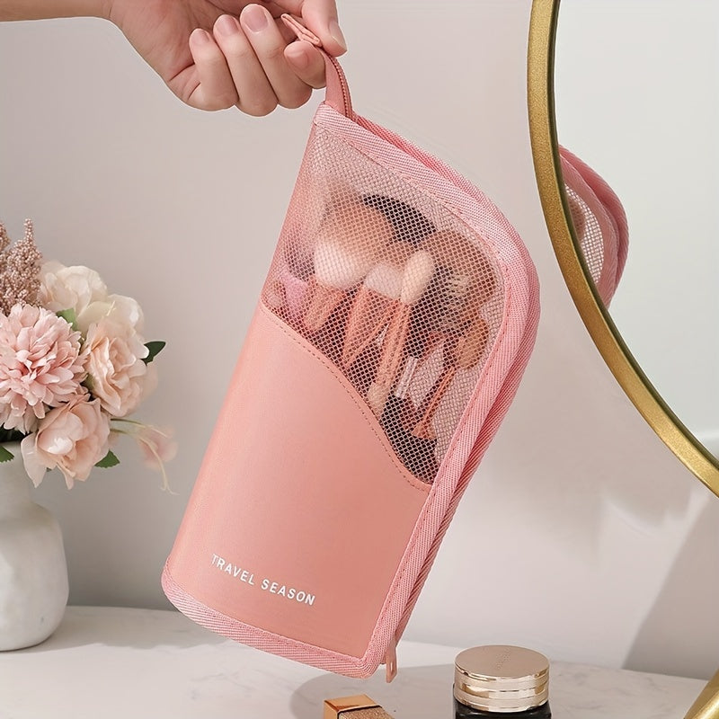 Waterproof wash bag with travel-friendly makeup brush storage, compartmentalized cosmetic storage, and a clear, transparent design.