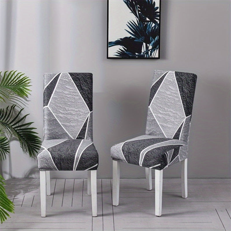 Contemporary geometric chair slipcovers in black and white. Stretchable, dustproof, lightweight fabric. Ideal for home, hotel, or restaurant decor. Easy care, machine washable. Set of 4 or 6.