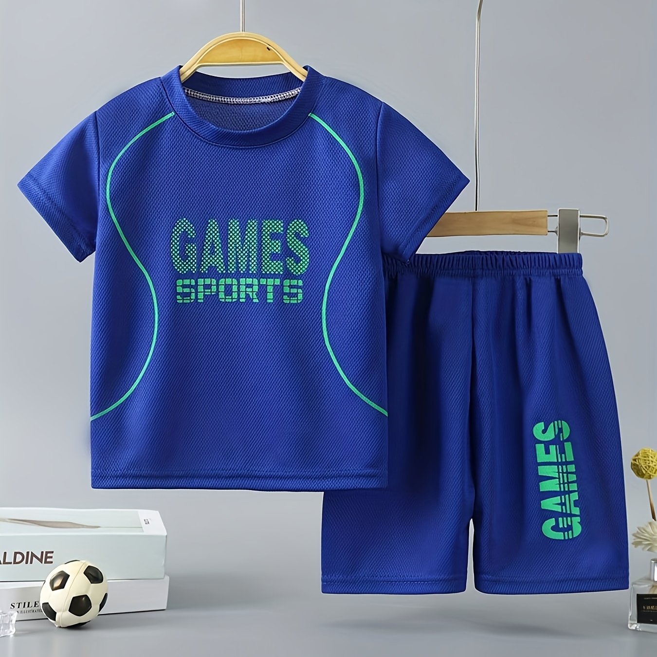 Boys' 2pc quick-drying outfit with GAMES SPORTS print t-shirt and shorts for summer outdoor wear.