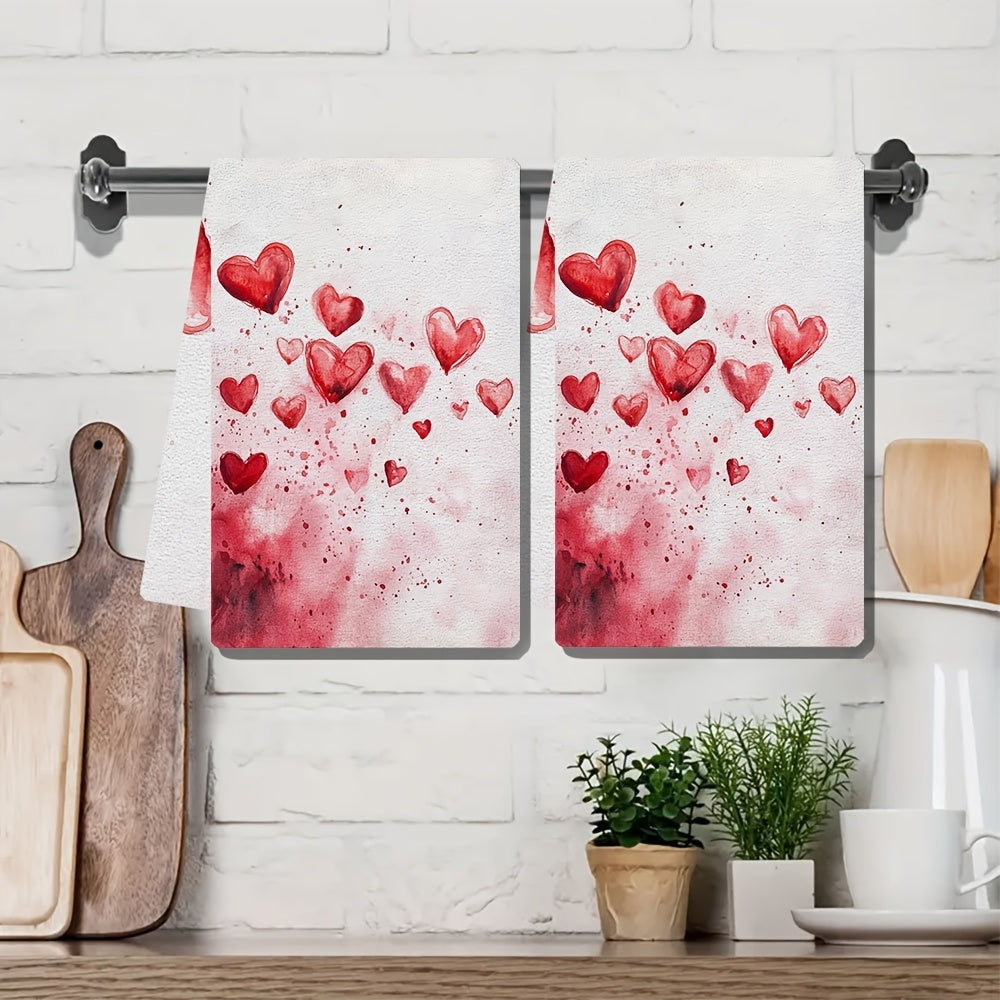 Set of 2 Valentine's Day Kitchen Towels, featuring 'Love At First Swipe' Hearts design. These Ultra Soft and Highly Absorbent Dish Hand Towels are perfect for holiday decor. Machine washable, each towel measures 16x24 inches. Item number: 2KYSYS1217559