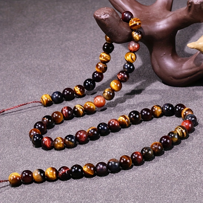 Loose round beads made from natural three-color Tiger Eye stone available for wholesale. Perfect for creating semi-finished DIY jewelry such as woven bracelets, necklaces, and sweater chains.