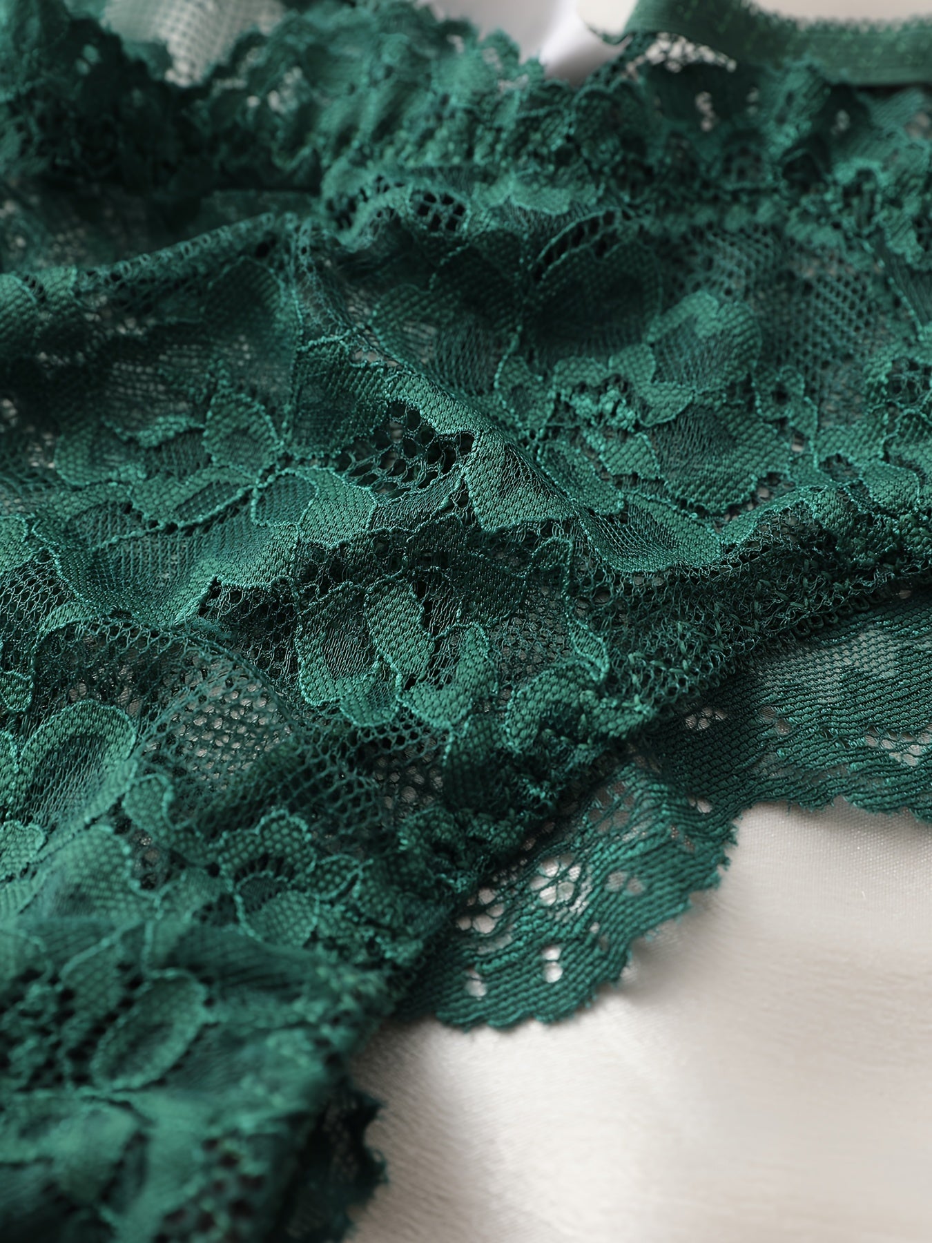 Beautiful lace lingerie set with mint accents, featuring a sexy European and American French style.