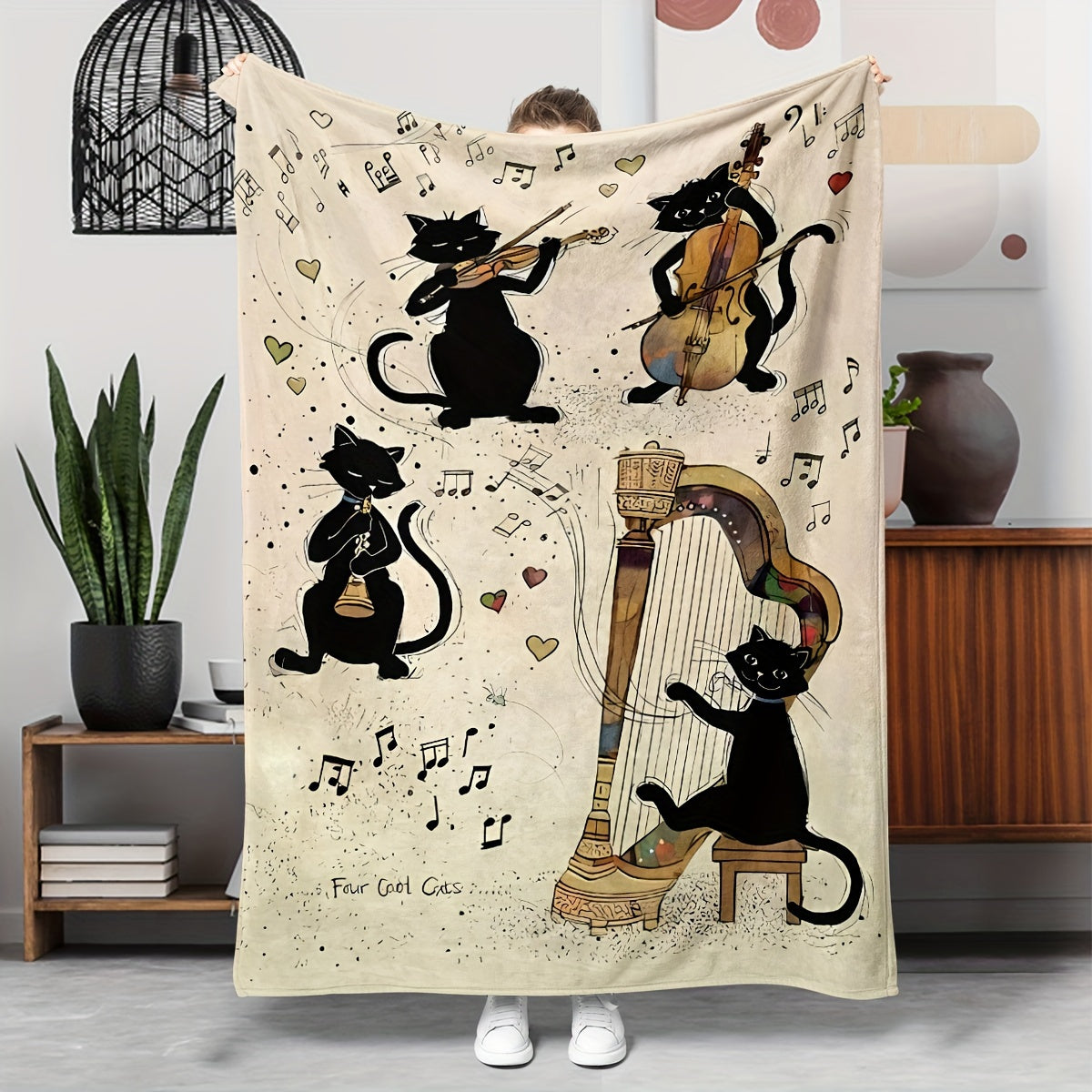 The Cozy Black Cat and Guitar Music Lover's Throw Blanket is made of soft, all-season flannel, making it perfect for outdoor travel and camping. This large blanket also makes a great gift.