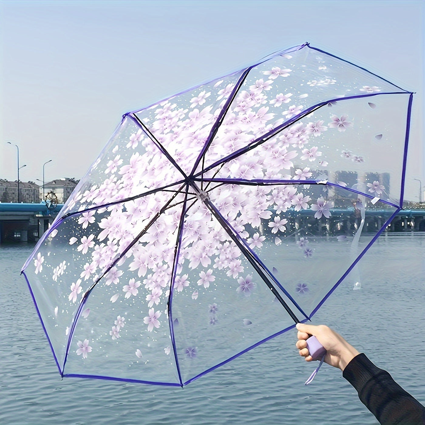 Chic cherry blossom folding umbrella for men and women, ideal for travel and outdoor activities.