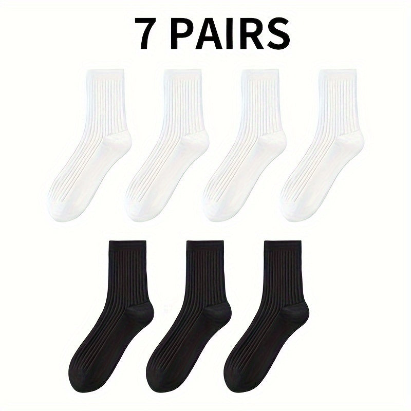 7 pairs of black and white thick mid-length socks for comfortable and breathable wear in autumn and winter.