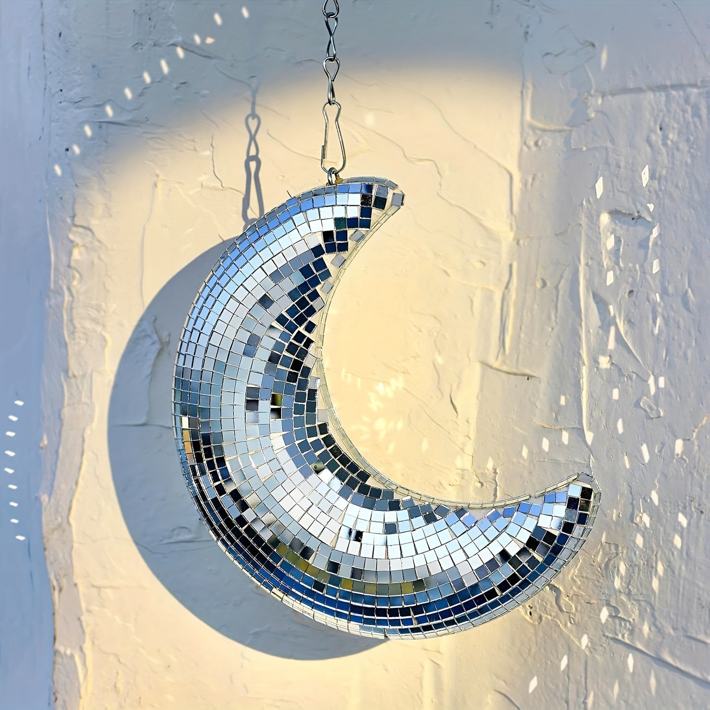 Handcrafted moon-shaped silver disco ball for home and party decor, ideal for holidays like Christmas, Valentine's Day, Thanksgiving, and New Year. Great for both Christmas and Thanksgiving.