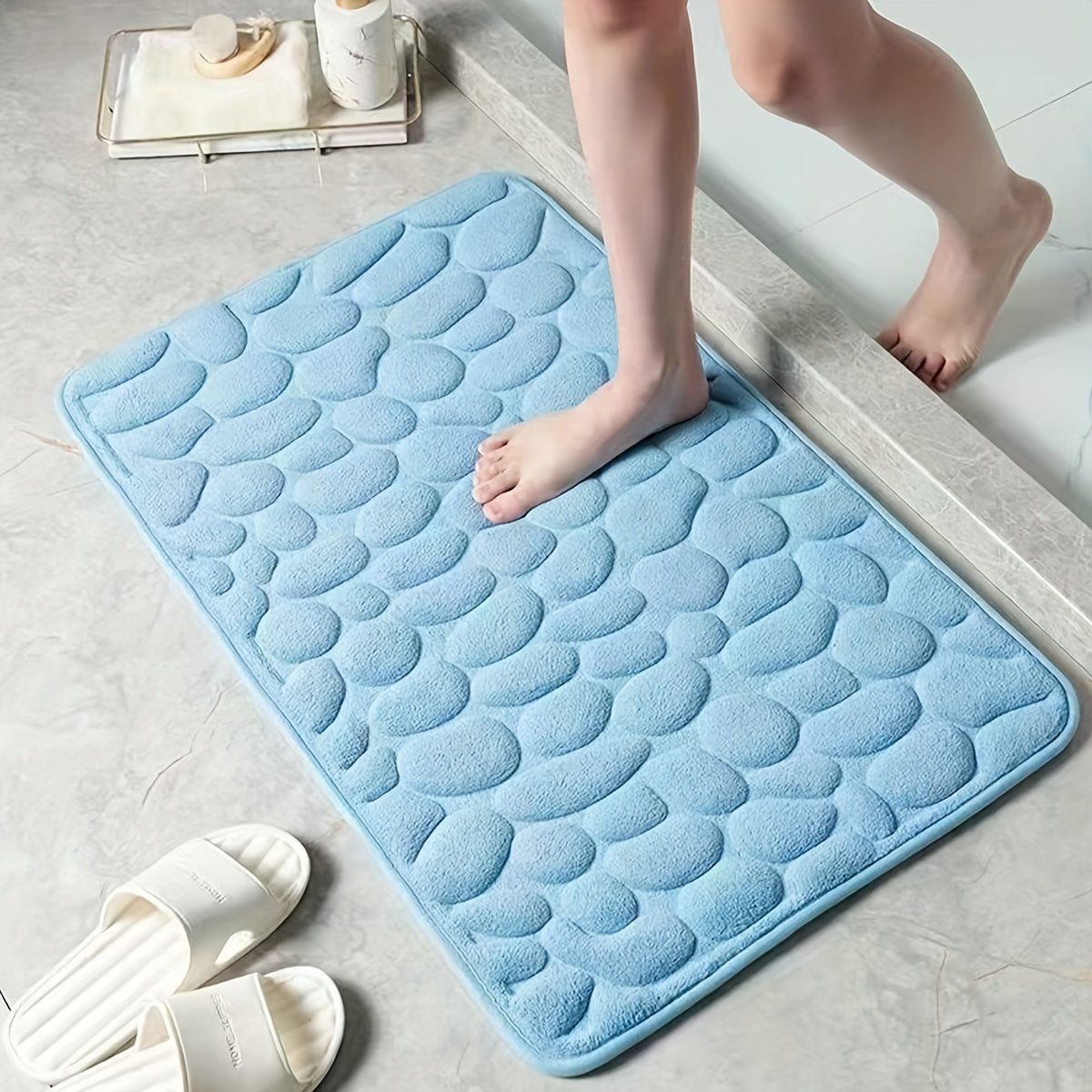 Pamper Your Feet with our Luxurious 3D Pebble Design Bath Rug! This Quick-Dry Non-Slip Bathroom Mat is made of Soft and Comfortable Polyester Memory Foam. It is Woven with a density of 700gsm and is 1.5cm Thick. Perfect for Home Decor and as Holiday