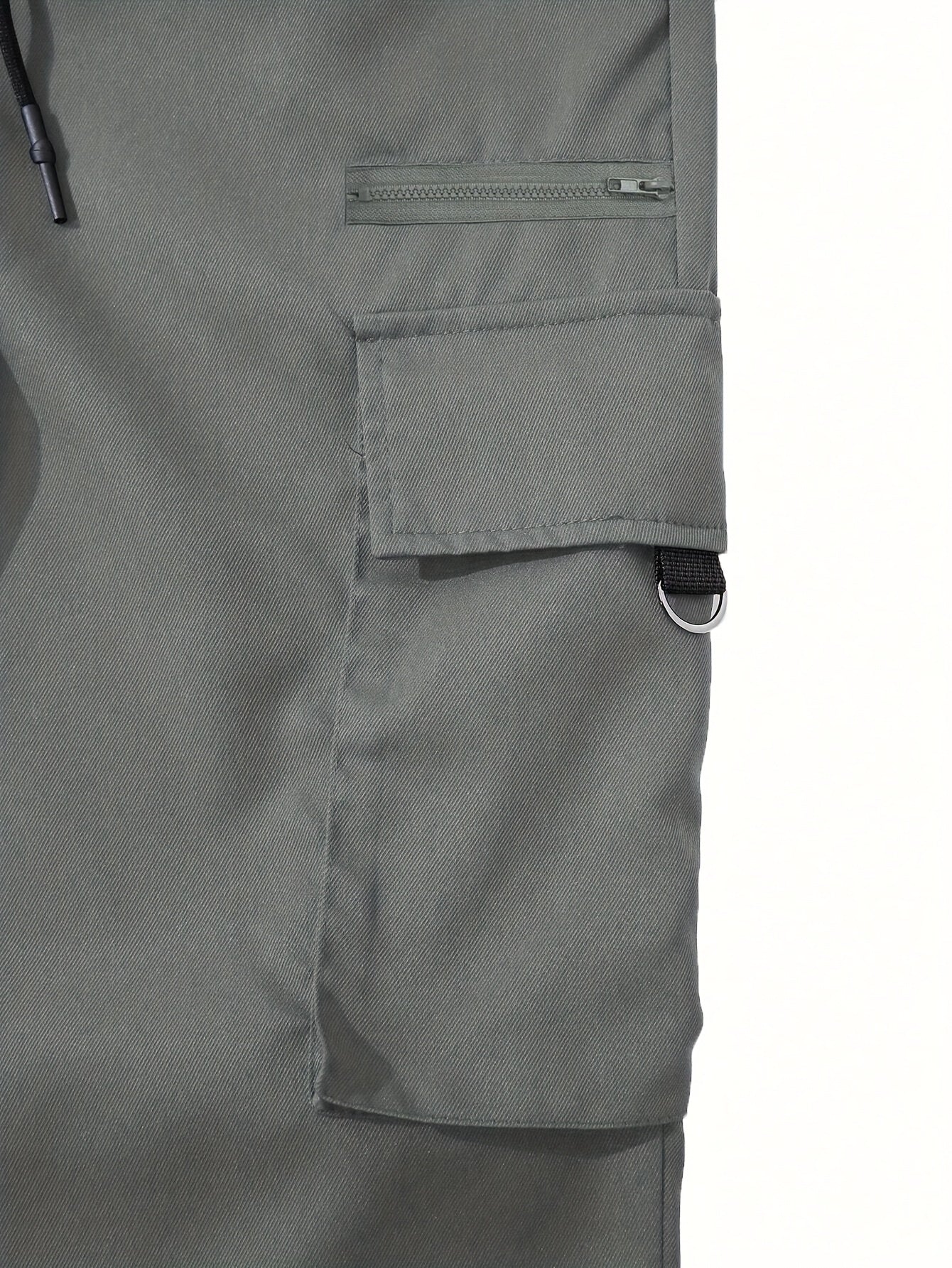 Men's cargo pants with multiple pockets and drawstring for outdoor activities.