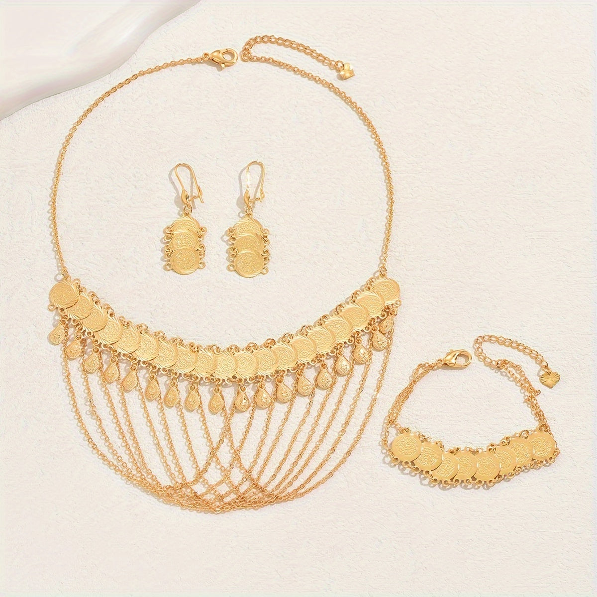 Stylish Four-Piece Set of Tassel Necklace, Coin Earrings, and Bracelet in 18K Gold Plating, Perfect for Everyday Wear