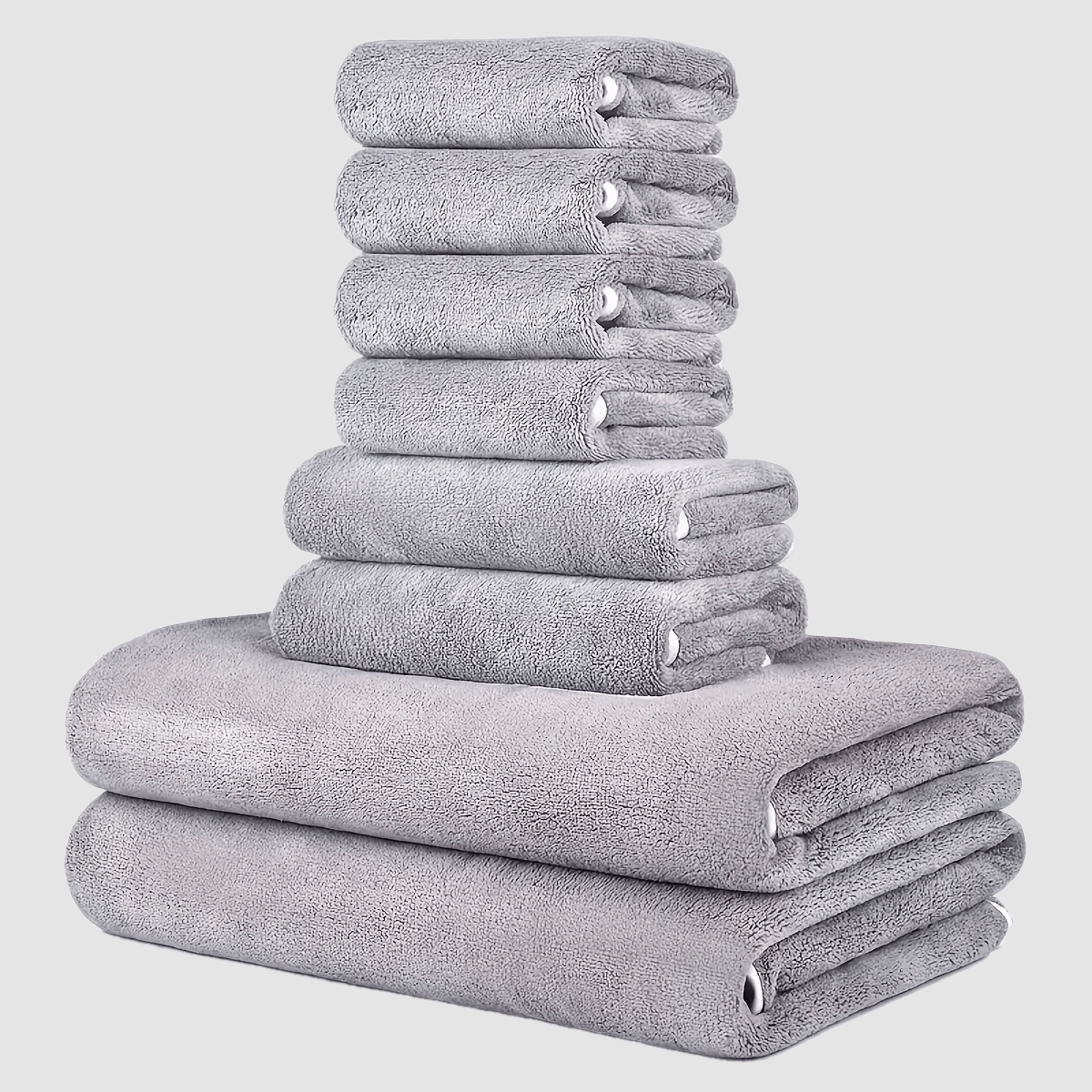 This 8-piece set includes 2 bath towels (68.58 X 139.7 cm), 2 towels (34.8 X 74.93 cm), and 4 square towels (29.97 X 29.97 cm). They are super soft, quick-drying, absorbent, and