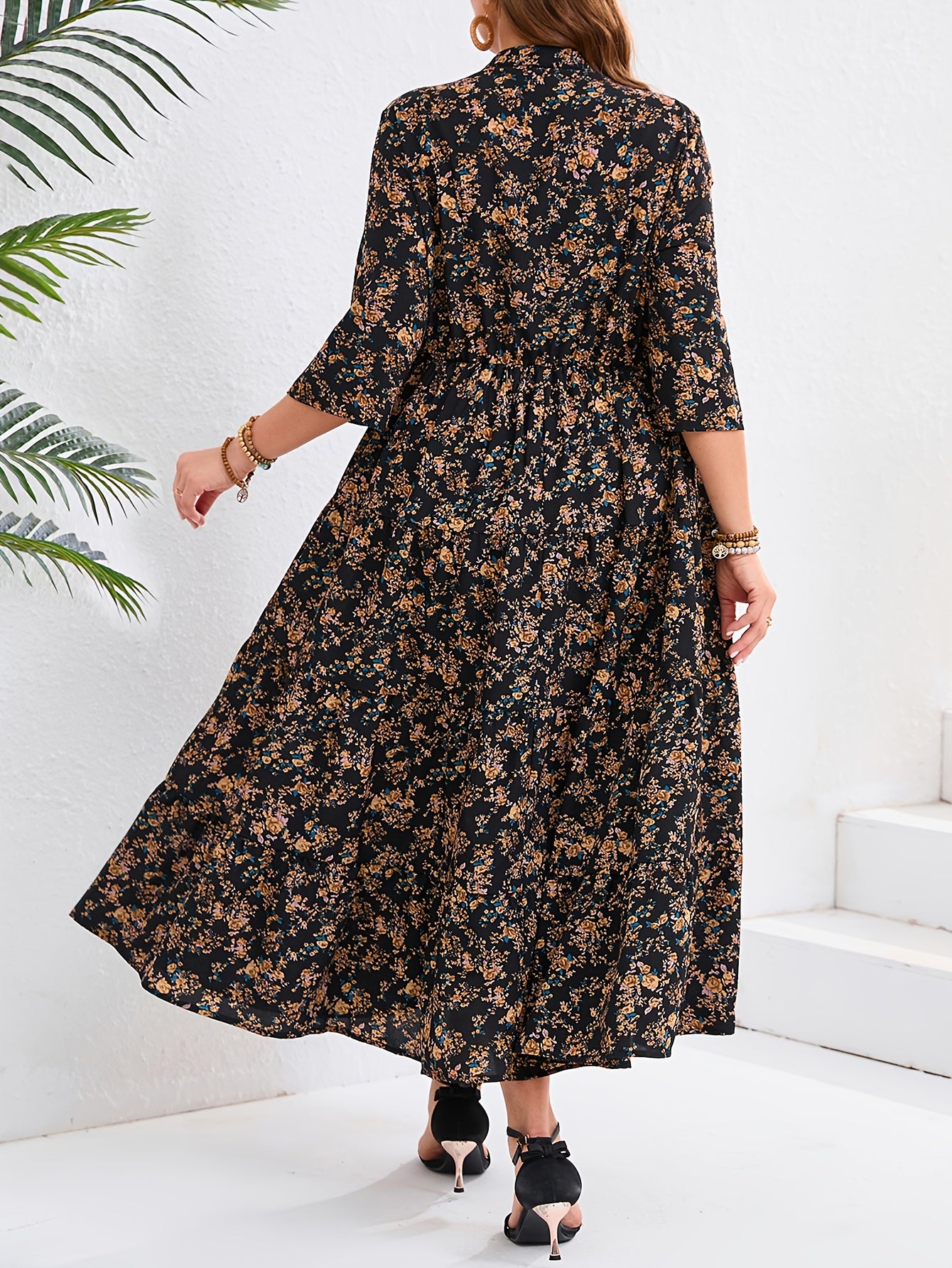 Elegant floral print V-neck midi dress with peplum hem in non-stretch polyester fabric. All-season versatile style.