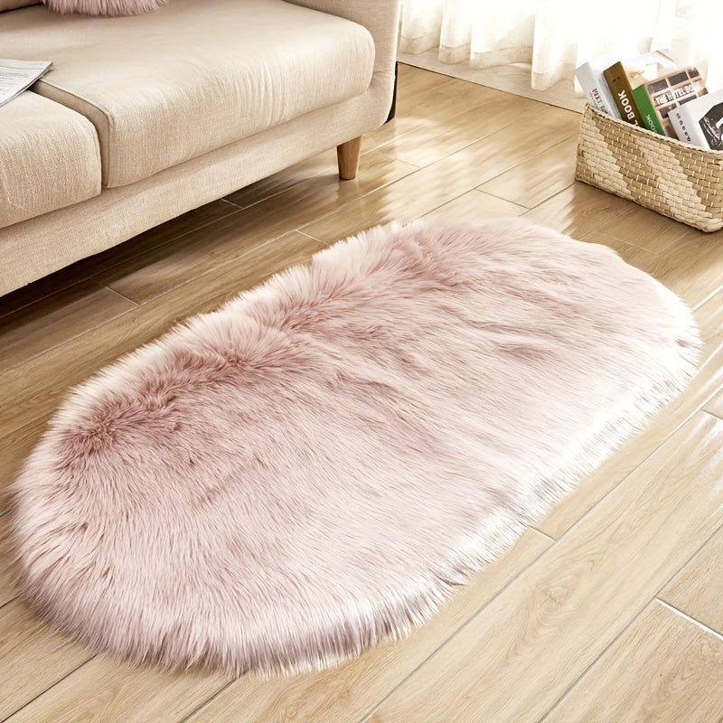 One piece of a luxurious Super Soft Area Rug, featuring a Plush Fluffy Faux Sheepskin design in an Oval shape, perfect for adding warmth to your Living Room or Bedroom. This Machine Washable Bedside Rug is made of Shaggy Plush Carpet Faux material, ideal