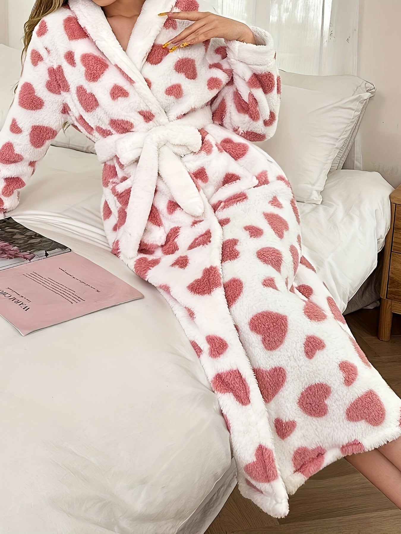 Women's plus size casual robe with heart pattern, long sleeves, and belt. Made of warm flannel for fall and winter loungewear.