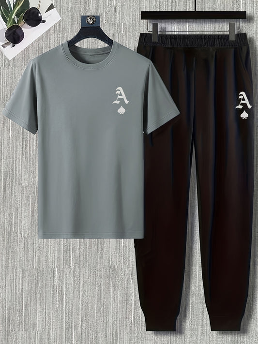 Men's casual sports set with short sleeve round neck t-shirt and regular fit pants, made of polyester and spandex blend for breathability and stretch. Printed logo on shirt.