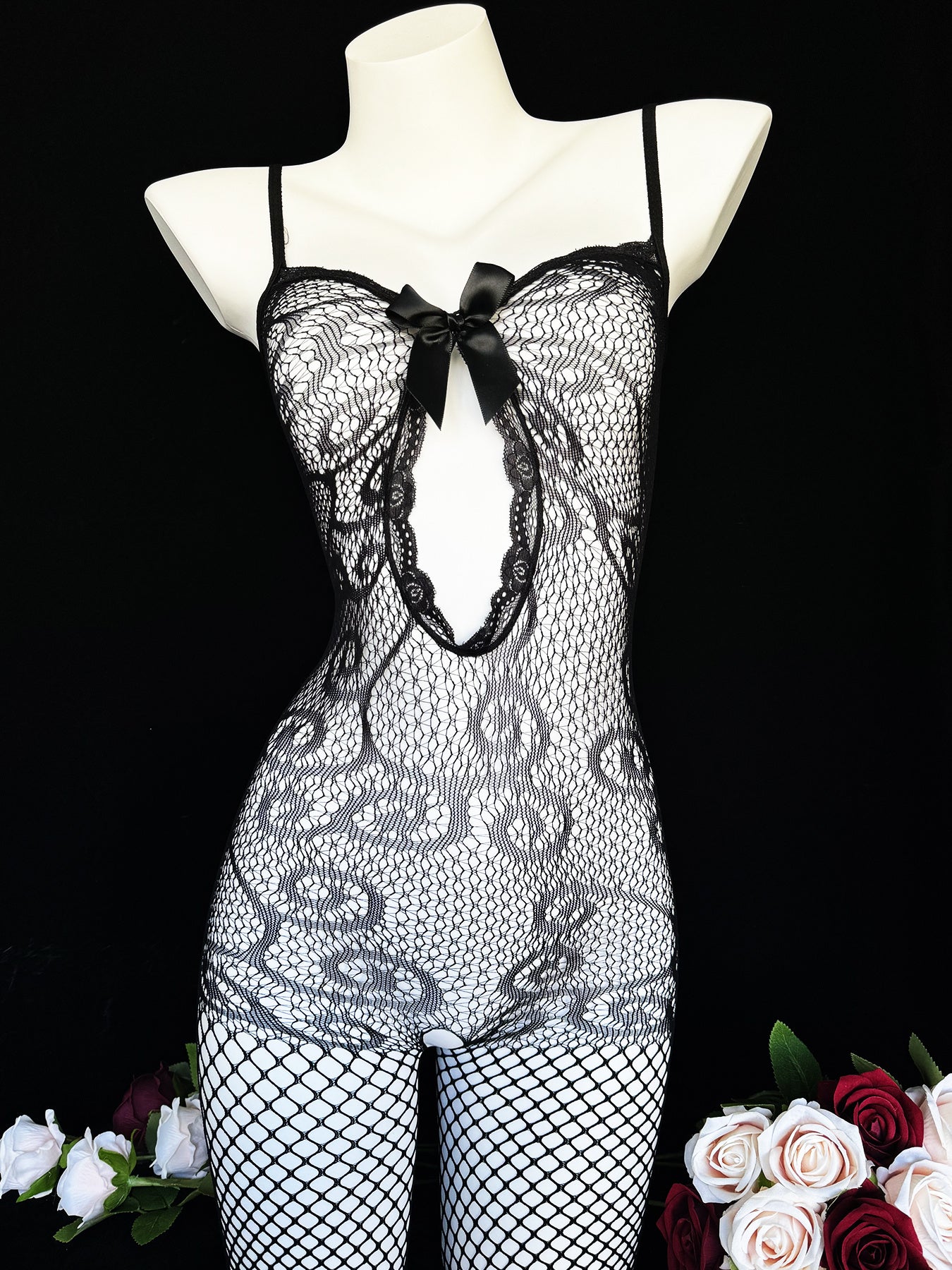 Sexy lace fishnet bodysuit for a romantic date or Valentine's Day. Black see-through stockings for confident nights.