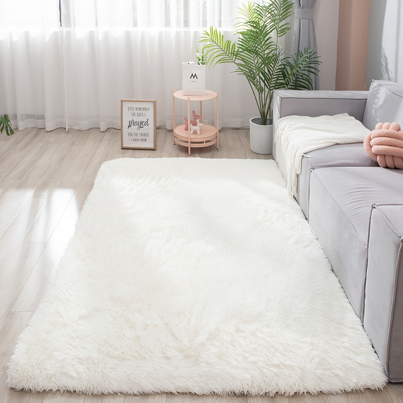 Soft and fluffy rectangle area rug perfect for your bedroom. This plush carpet is thick and non-slip, making it ideal for your living room. Made with machine-made polyester fiber, this low-pile rug is washable for easy cleaning. Perfect for indoor use.