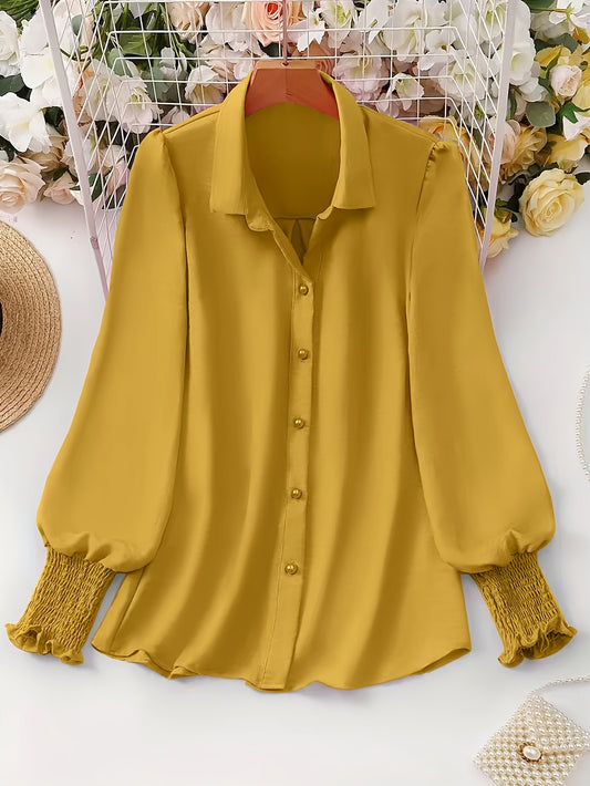 Stylish plus size blouse with ruffle trim, solid color, button-up front, long sleeves, lapel collar, and non-stretch polyester blend - suitable for all seasons.