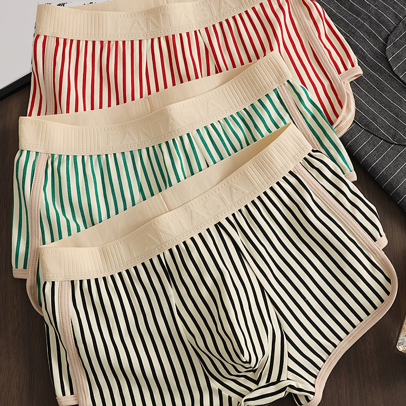 Men's three-pack striped underwear with casual flat-leg shorts, breathable and comfortable elastic waistband, perfect for spring and summer sports.