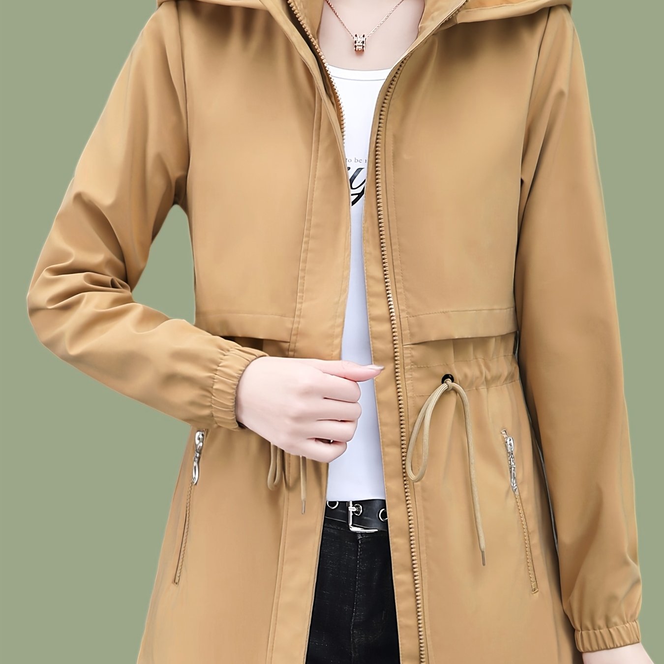 Zip-up windbreaker hoodie jacket with drawstring waist, slant pockets, suitable for spring and fall. Women's casual clothing.